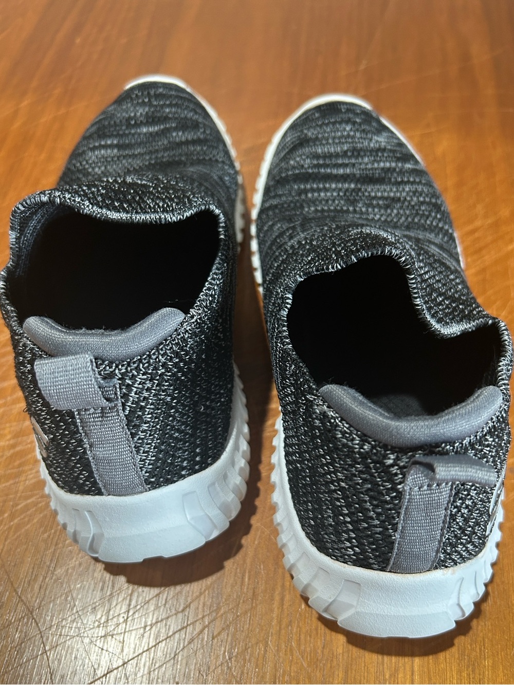 Skechers Black & White Slip-On Knit Sneakers - Picture 5 of 7